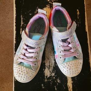 Little girl Skechers twinkle toes sneakers with velcro and lights